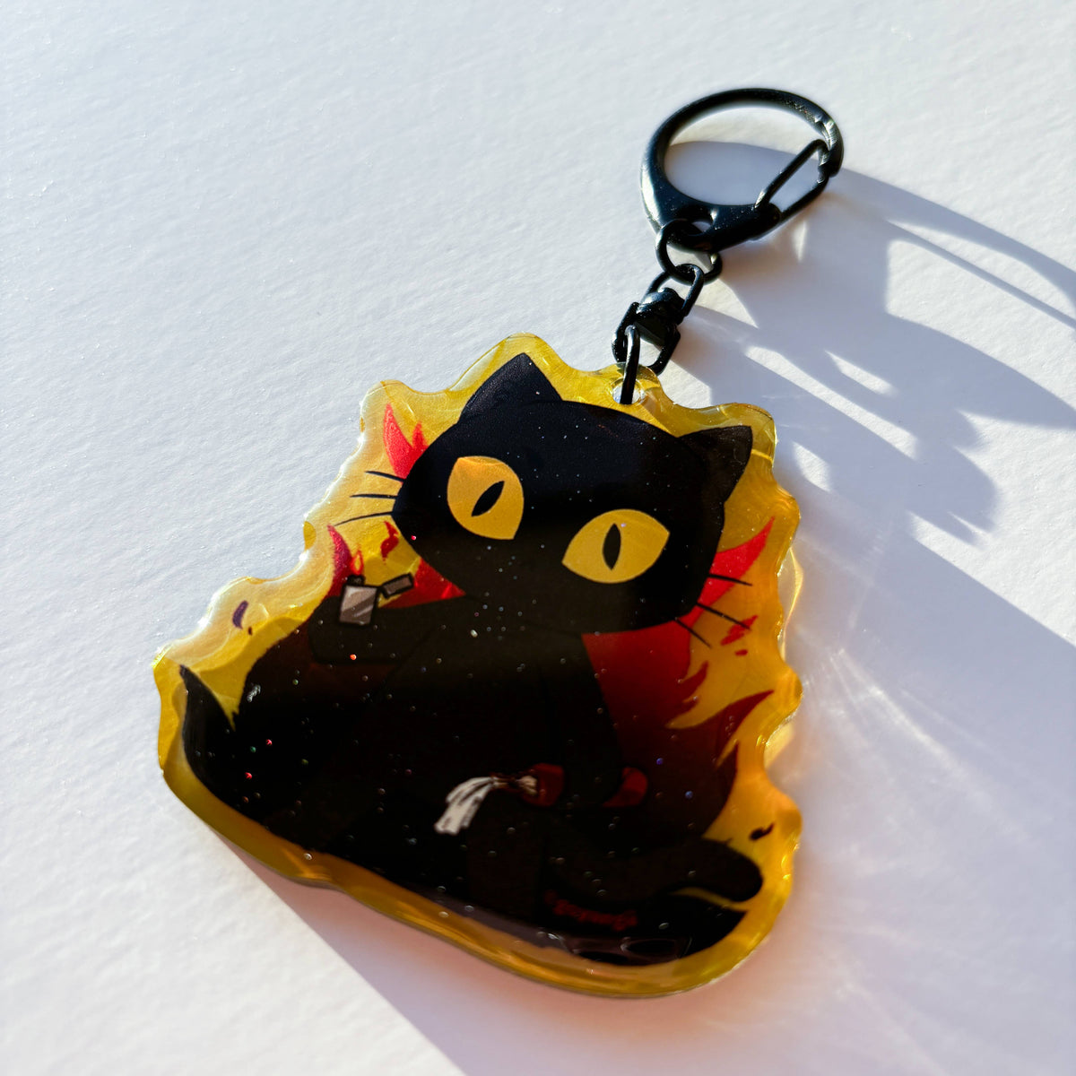 Arson Cat Glitter Acrylic Keychain
