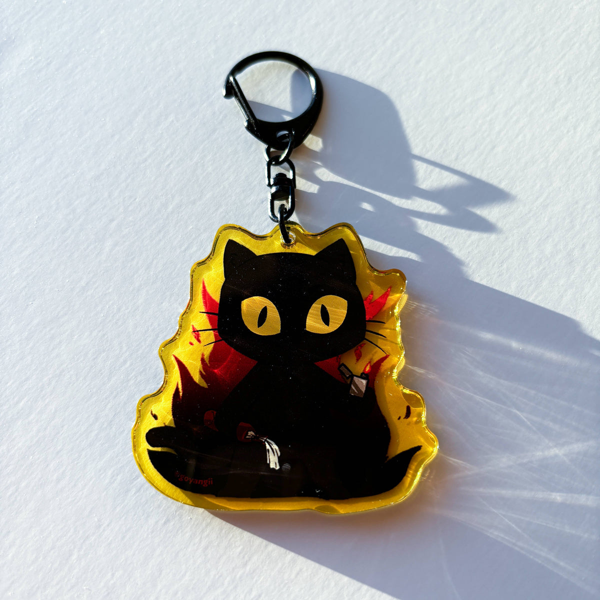 Arson Cat Glitter Acrylic Keychain