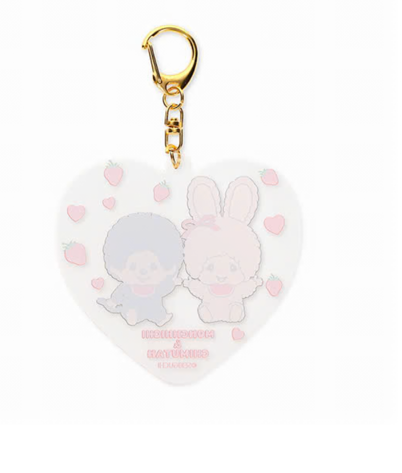 A heart-shaped acrylic keychain featuring a pastel illustration of two cartoon characters, one blue and one pink, with pink strawberry accents and a gold clasp at the top.