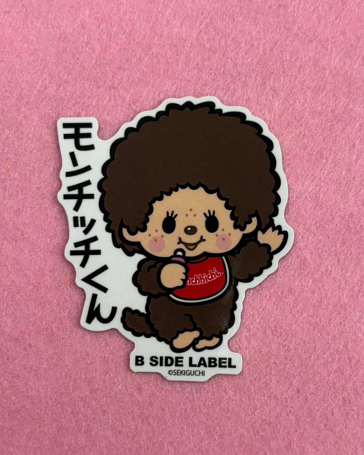 Sticker of a cartoon character on a pink background