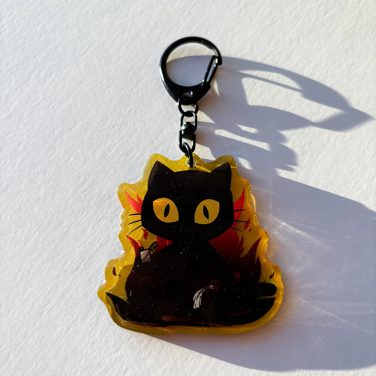 Arson Cat Glitter Acrylic Keychain