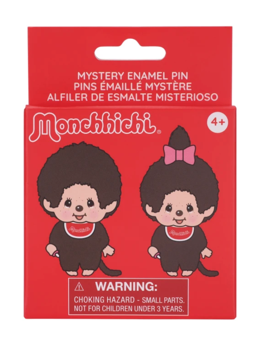 Monbichi Mystery Enamel Pin packaging in red cardboard box with cartoon monkey illustrations and a warning label, photographed on a white background.